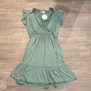 NWT Mini dress, WITH POCKETS, capped sleeves Color: Jade/light green Size S